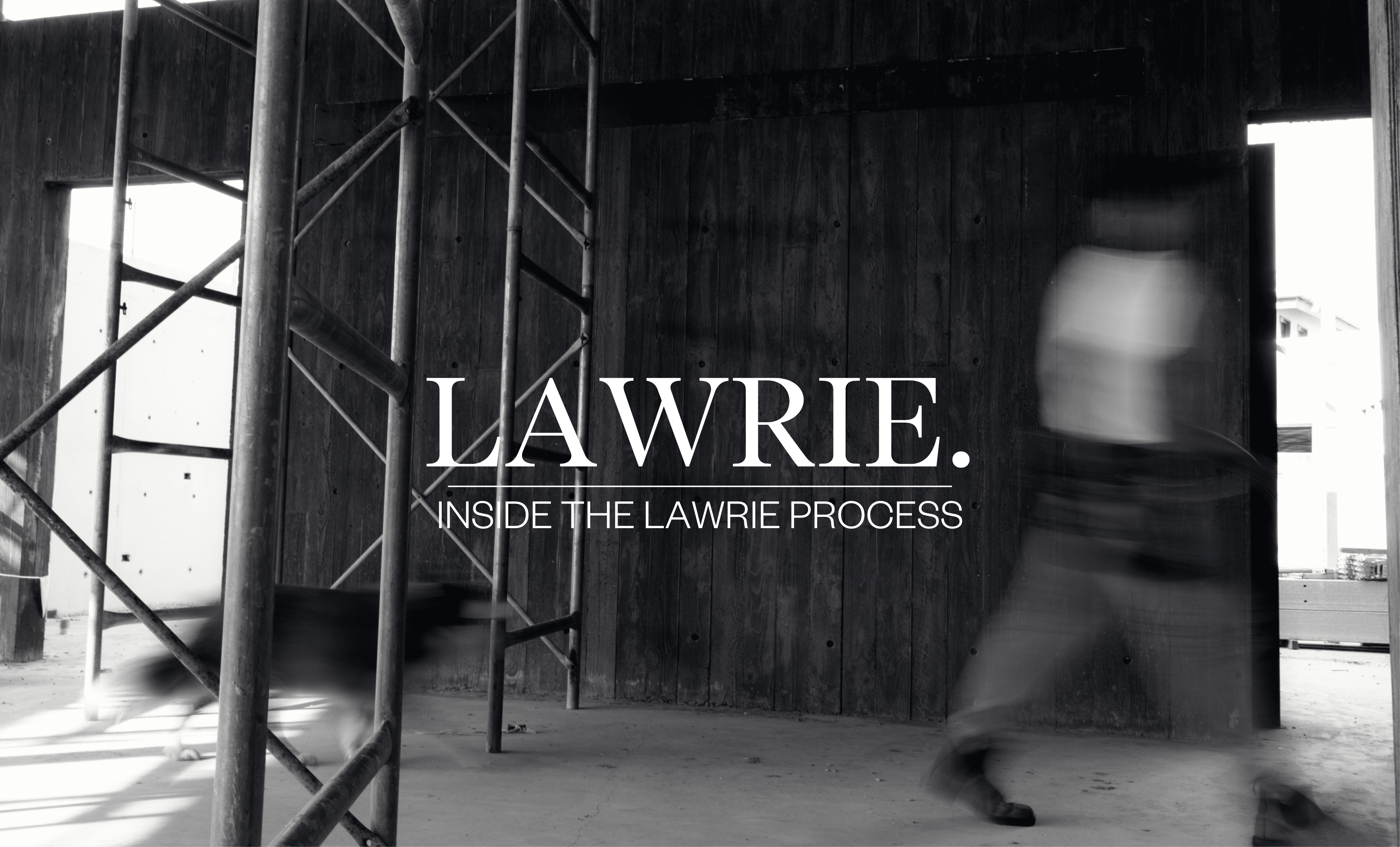 Image of Dayne Lawrie at a custom home construction site with words LAWRIE, inside the LAWRIE process across it.
